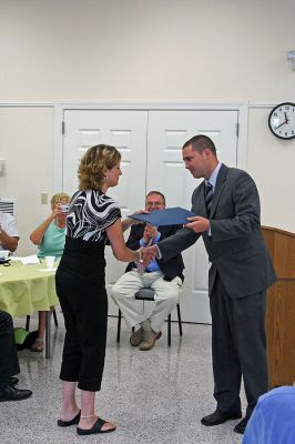 Dispatcher Honored
Rochester Chief Dispatcher Tracy Eldridge accepts a commendation before receiving the Thirteenth Annual Jeff Grossman 9-1-1 Telecommunicator of the Year Award on June 29. (Photo by Robert Chiarito).

