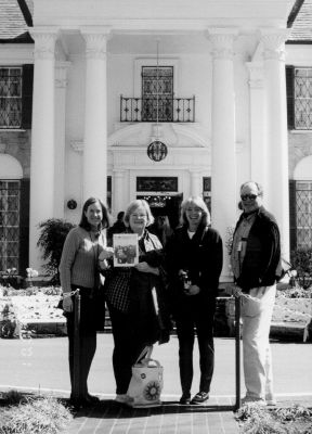 03-22-01
3,000 Miles to Graceland ... well, maybe not quite that far, but it was certainly a long way for this foursome to go to pose with a copy of The Wanderer  just outside the entrance to The Kings former home in Memphis, Tennessee. While most of the students and faculty at Tabor Academy in Marion headed to warmer climates for the recent Spring Break, this entourage spent three days visiting the home and city that Elvis Presley so dearly loved. Pictured here outside Graceland are (l. to r.) Dana Palmer-Donnelly, formerly of Marion and now of Hingham; her mother Donna Palmer of Marion, a member of the Tabor Academy staff and a lifelong Elvis fan; and Tina and Winslow Lewis of Falmouth, the parents of a Tabor Academy senior. Also along for the trip (but not pictured) were Chris and Shelley Wells of Orleans.  3/22/01 edition
