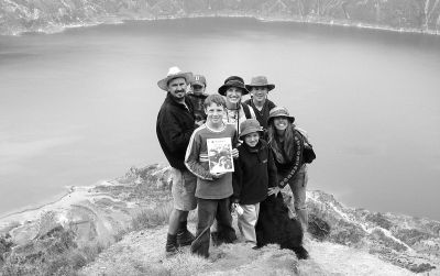 031804
George Kirby of Rochester poses with his family, as well as his sister Michelle (also a Rochester native), at Laguna Quilatoa in Ecuador. Michelle built an inn in the mountains and moved to Ecuador 10 years ago. Members of the Kirby family pictured here with a copy of The Wanderer include George holding daughter Grace; his wife Shari; his son Zack holding The Wanderer; Sam in front; son George in back (right); and sister Michelle (far right). (Photo courtesy of George Kirby). 3/18/04 edition
