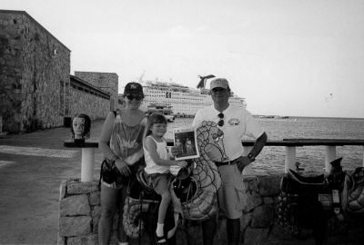 04-12-01-4
Janice, Hilary and Katie Kearns of Mattapoisett traveled to Cosmel, Mexico for their February vacation and were able to find a familiar-looking seahorse seat on which to pose with a copy of The Wanderer. The trio made a brief stop while on a cruise ship, which can be glimpsed in the background. (Photo courtesy of the Kearns family.) 4/12/01 edition
