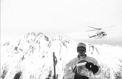 04-18-02-6
Skip Harris of Mattapoisett recently went Whistler Heliboarding in British Columbia, Canada and posed here with a copy of The Wanderer after being dropped off by the helicopter in the background. 4/18/02 edition
