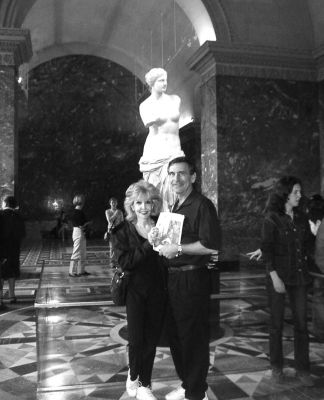 05-23-02-3
During a trip to Paris this past Easter, John DeRugeris, a resident of Mattapoisett and Marion for the past 22 years, posed with friend Sonni Siegel from Rockville Centre, NY with the statue of Venus DiMilo which is housed in the Louvre Museum in Paris. The Louvre also boasts the Mona Lisa and Winged Victory as its most popular pieces. 5/23/02 edition

