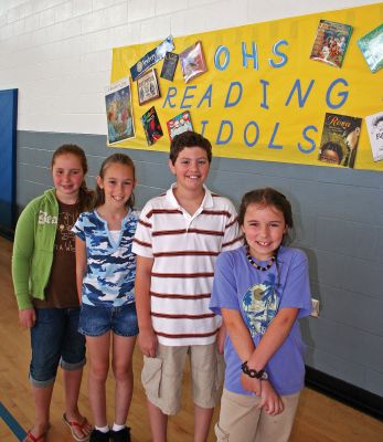 Book Smart
Old Hammondtown School in Mattapoisett recently completed their first-ever Reading Idol program which began in February. Students were given incentive raffle tickets for every hour of extracurricular reading they did which could be exchanged for chances to win various prizes during a school assembly held on Friday, June 1. Pictured here (l. to r.) are the Top Four winners of this years Reading Idol contest: Rose Haznar (Grade 6, second place); Kristin Nascimento (Grade 6, first place); Lenny Murphy (Grade 5, fourth place); and Jackie Dyson (Grade 4, third place). (Photo by Kenneth J. Souza).
