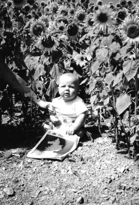 09-13-01
Little Sam Hartley-Matteson of Mattapoisett poses with a copy of The Wanderer in a sunflower maze on his grandparents dairy farm in upstate New York during a recent vacation there. Now that the unofficial end of summer is here, its good to look back at one final summertime image before turning our thoughts to fallen leaves, Halloween and the forthcoming holidays. This picture was submitted by Sams mom and dad, Amy and Jesse, who helped little Sam strike this adorable pose. 9/13/01 edition
