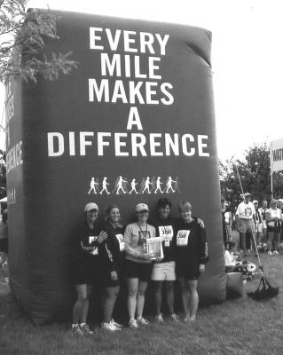 112504-4
(L. to R.) Rachel VanVoorhis, Leslie Boyle, Glenna Sanford, and Beth Martin (all from Mattapoisett) and Anne Jang, MD, pose with a copy of The Wanderer after having walked 60 miles from Topsfield, MA to Boston for the Susan G. Komen Breast Cancer Three-Day Benefit.  11/25/04 edition
