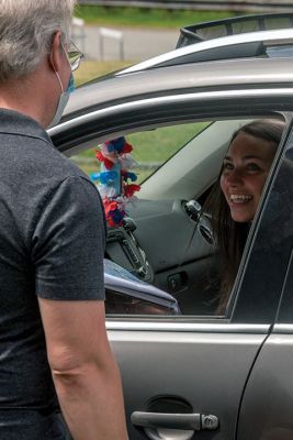 Class of 2020 
Graduating seniors in the Old Rochester Regional High School Class of 2020 drove around to the back of the school building on May 28, where they were greeted by faculty and administration. After arriving in order of homeroom to ensure safe spacing, the seniors turned in textbooks and received yearbooks, a surprise COVID-19 gift bag, and a long-sleeve t-shirt decorated with the mascot Bulldog and the word ‘Quarantine’ spelled across the front. Photo by Ryan Feeney
