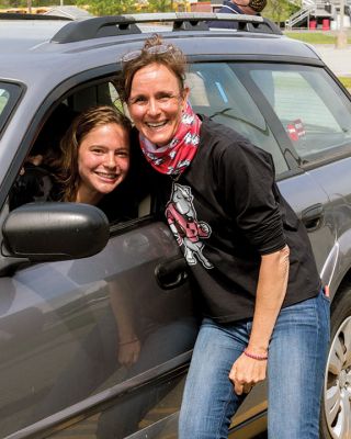 Class of 2020 
Graduating seniors in the Old Rochester Regional High School Class of 2020 drove around to the back of the school building on May 28, where they were greeted by faculty and administration. After arriving in order of homeroom to ensure safe spacing, the seniors turned in textbooks and received yearbooks, a surprise COVID-19 gift bag, and a long-sleeve t-shirt decorated with the mascot Bulldog and the word ‘Quarantine’ spelled across the front. Photo by Ryan Feeney
