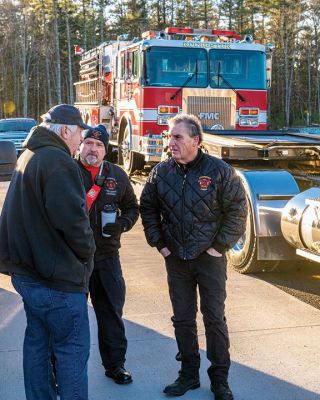 Tanker Donation
Rochester Fire Lieutenant Kevin Richard, center, and Fire Chief Scott Weigel, right, talk with Jim Wiksten of RYCO Excavation before Monday morning’s departure of the town’s surplus tanker truck on a 1,229-mile journey to Cayce, Kentucky. The small community in the nation’s heartland was devastated by a December 10 tornado, and its fire department was demolished as a result. Having recently replaced the aged tanker truck, the Town of Rochester got word and made repairs  Photos by Ryan Feeney - Jan. 13, 202
