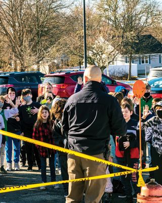 Crime Scene Investigation
Mattapoisett Police Detective Scott LeBlanc made an appearance at Old Hammondtown School on Friday, when Emily DeBortoli (Italia shirt) and many other fifth graders learned about investigating crime scenes outside the school building. Photos by Ryan Feeney
