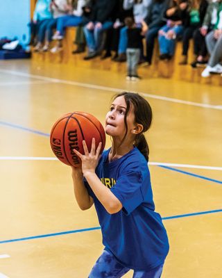 Grade 2 Basketball Playoffs
The Grade 2 basketball playoffs brought out the best in March 10 action at Center School in Mattapoisett. The Warriors earned their spot in the championship game with a big, 10-2 victory over the Heat, while the Knicks advanced to the title game, narrowly edging the Celtics, 10-8. In the final, 10-2, the Warriors defeated the Knicks, 24-14. Photos by Ryan Feeney
