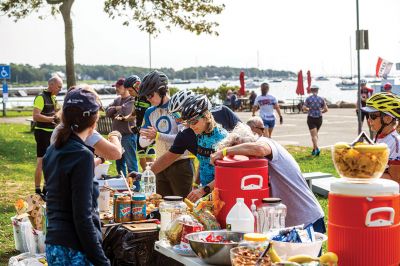 Cranberry Harvest Race
Participants in Sunday's Cranberry Harvest Race stopped at Mattapoisett Wharf to rest up and get some nourishment. The bike ride starting and finishing in Myles Standish State Forest in Plymouth also traveled through Carver, Rochester and Acushnet. Photos by Ryan Feeney
