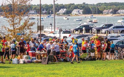 Cranberry Harvest Race
Participants in Sunday's Cranberry Harvest Race stopped at Mattapoisett Wharf to rest up and get some nourishment. The bike ride starting and finishing in Myles Standish State Forest in Plymouth also traveled through Carver, Rochester and Acushnet. Photos by Ryan Feeney
