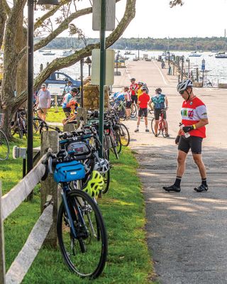 Cranberry Harvest Race
Participants in Sunday's Cranberry Harvest Race stopped at Mattapoisett Wharf to rest up and get some nourishment. The bike ride starting and finishing in Myles Standish State Forest in Plymouth also traveled through Carver, Rochester and Acushnet. Photos by Ryan Feeney
