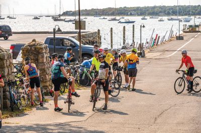 Cranberry Harvest Race
Participants in Sunday's Cranberry Harvest Race stopped at Mattapoisett Wharf to rest up and get some nourishment. The bike ride starting and finishing in Myles Standish State Forest in Plymouth also traveled through Carver, Rochester and Acushnet. Photos by Ryan Feeney
