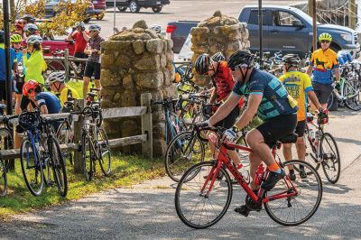 Cranberry Harvest Race
Participants in Sunday's Cranberry Harvest Race stopped at Mattapoisett Wharf to rest up and get some nourishment. The bike ride starting and finishing in Myles Standish State Forest in Plymouth also traveled through Carver, Rochester and Acushnet. Photos by Ryan Feeney
