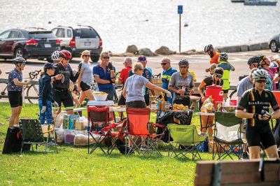 Cranberry Harvest Race
Participants in Sunday's Cranberry Harvest Race stopped at Mattapoisett Wharf to rest up and get some nourishment. The bike ride starting and finishing in Myles Standish State Forest in Plymouth also traveled through Carver, Rochester and Acushnet. Photos by Ryan Feeney
