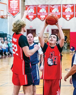 Old Rochester Regional Unified Basketball
The Old Rochester Regional Unified Basketball team capped off its 2022-23 season with a 72-51 victory over Tri-Town Police officers at the high school. Try as they might, the local officers were unable to contain ORR’s Unified team, made up of special-needs athletes and partners who together played a fall schedule of games against other schools. 
