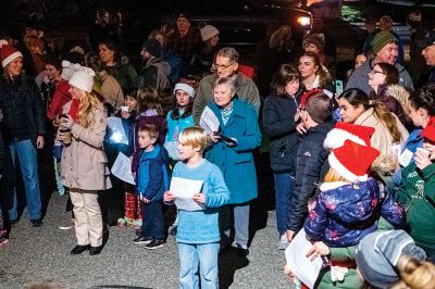 Rochester Christmas
A crowd of Rochester citizens, young and old, gathered outside Town Hall late afternoon on Monday for the annual lighting of the town's Christmas tree. The Select Board, scheduled to meet at 6:00 pm, participated in the 5:00 pm activity, while Santa Claus and the Grinch also made triumphant appearances. Photos by Ryan Feeney
