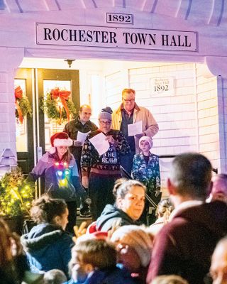 Rochester Christmas
A crowd of Rochester citizens, young and old, gathered outside Town Hall late afternoon on Monday for the annual lighting of the town's Christmas tree. The Select Board, scheduled to meet at 6:00 pm, participated in the 5:00 pm activity, while Santa Claus and the Grinch also made triumphant appearances. Photos by Ryan Feeney
