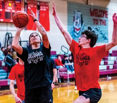 Class of 2025 students and Old Rochester Regional High School Faculty
The battles under the baskets were frequent and fierce, as Physical Education teacher Alli Lima displayed while attacking the paint during the Old Rochester Regional High School's basketball game pitting Class of 2025 students against ORR faculty on March 23 in the high school gymnasium. Photo by Ryan Feeney
