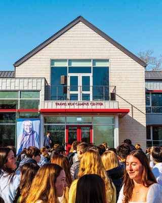 Travis Roy Student Center
Tabor Academy hosted an Open House on Tuesday morning at the new Travis Roy Student Center, which replaces the former library on the same spot. While the late Travis Roy is most widely known as a student-athlete whose college-hockey career lasted all of 11 seconds, his passion for student life, ceramics, sailing and the big part the Marion campus played in his life is reflected in the building of the new student center bearing his name. Photo by Ryan Feeney
Keywords: Travis Roy Student Center