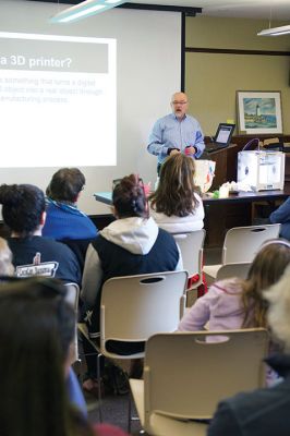 3D Printing
The Mattapoisett Free Library unveiled its brand new 3D printer this weekend during a presentation given by tech expert Kevin Osborn. Osborn gave a demonstration on Saturday, April 16, of the library’s very own brand new Ultimaker 2 3D printer. Photos by Colin Veitch
