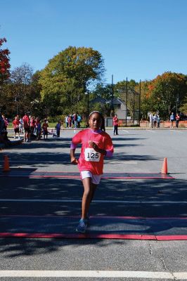 Healing Little Hearts 5K 
Upward of 300 runners competed in the inaugural Healing Little Hearts 5K on a beautiful Columbus Day morning. The organization helps fund research efforts into children’s heart defects. “From my family and from the families you’re helping, thank you,” said Kelly Weglowski, who, along with husband, Marc, and daughter Jillian founded Healing Little Hearts in the midst of their son and brother Brady’s own battle. Photos by Shawn Badgley. 
