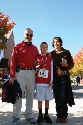 Healing Little Hearts 5K 
Upward of 300 runners competed in the inaugural Healing Little Hearts 5K on a beautiful Columbus Day morning. The organization helps fund research efforts into children’s heart defects. “From my family and from the families you’re helping, thank you,” said Kelly Weglowski, who, along with husband, Marc, and daughter Jillian founded Healing Little Hearts in the midst of their son and brother Brady’s own battle. Photos by Shawn Badgley. 
