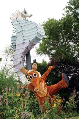 Wanderer Aardvark
The Wanderer Aardvark is out and about in anticipation of the weekend Harbor Days events at Shipyard Park in Mattapoisett. On Saturday, he was seen hanging out with another famous Mattapoisett resident, Salty the Seahorse. This year, The Wanderer will have its own booth at Harbor Days, with intermittent appearances by the Aardvark himself. Photo by Jean Perry July 14, 2016
