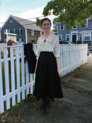 Abigail Field
The delightful Abigail Field, a student of history and appreciator of historical female fashion, gave a presentation on women’s fashion from the World War I era at the Mattapoisett Museum on September 8. Dressed in clothing and jewelry typical of the period between 1910-1920, Field discussed the war’s impact on the evolution of women’s fashion, the ensuing concept of comfortable clothing, and the male-dominance of the fashion industry. Photo by Marilou Newell
