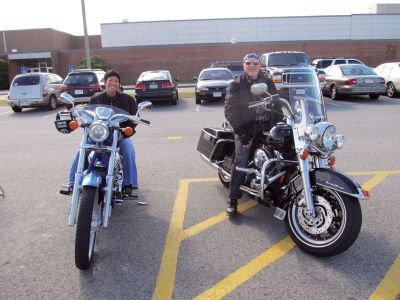 Ride for Alex
Nurse Karen Cabral, left, and Michael Wolfe, right, were two of the participants at the fifth annual poker run Ride for Alex event on September 18, 2011. The poker run benefits a Marion boy with Spinal Muscular Atrophy. Proceeds from the event offset costs, not covered by insurance, related to Alex Pateakos' well-being. Photo by Shawn Sweet.
