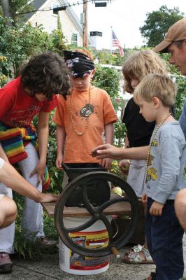 Fall Fun
The Mattapoisett Historical Museum and Carriage House hosted a cider-making and pumpkin-carving event at the Museum on September 26. Children got the chance to press their own cider, carve some silly faces, and peel apples. Nothing tastes better than cider youve made yourself! Photo by Felix Perez.
