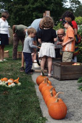 Fall Fun
The Mattapoisett Historical Museum and Carriage House hosted a cider-making and pumpkin-carving event at the Museum on September 26. Children got the chance to press their own cider, carve some silly faces, and peel apples. Nothing tastes better than cider youve made yourself! Photo by Felix Perez.
