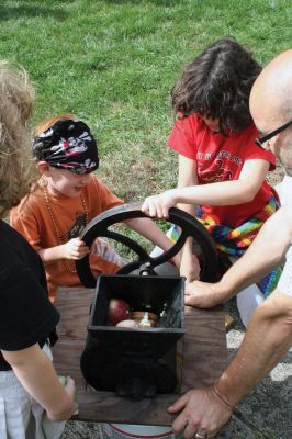 Fall Fun
The Mattapoisett Historical Museum and Carriage House hosted a cider-making and pumpkin-carving event at the Museum on September 26. Children got the chance to press their own cider, carve some silly faces, and peel apples. Nothing tastes better than cider youve made yourself! Photo by Felix Perez.
