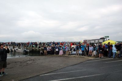 Arabella
A large crowd gathered on a rainy Saturday morning at Shipyard Park and Mattapoisett Harbor to witness the launch of “Acorn to Arabella,” a wooden sailboat made by hand in western Massachusetts. Photos by Mick Colageo
