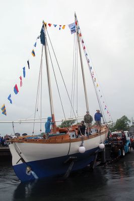 Arabella
A large crowd gathered on a rainy Saturday morning at Shipyard Park and Mattapoisett Harbor to witness the launch of “Acorn to Arabella,” a wooden sailboat made by hand in western Massachusetts. Photos by Mick Colageo
