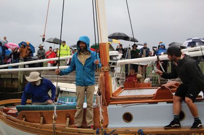 Arabella
A large crowd gathered on a rainy Saturday morning at Shipyard Park and Mattapoisett Harbor to witness the launch of “Acorn to Arabella,” a wooden sailboat made by hand in western Massachusetts. Photos by Mick Colageo
