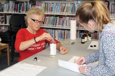 ‘Chillaxing’ at Plumb Library
‘Chillaxing’ at Plumb Library: Kara Underhill, 12, Emma Makuch, 10, and Bridget Farias, 11, joined Wellness Practitioner Marcia Hartley to mix essential oils in a stress-free zone on the snowy Tuesday of February 17. Chill-ax was part of Plumb Library’s school vacation week programming, which includes ‘Peace it On’ infant relaxation on February 20 from 11:30 am - 12:00 pm, with ‘Yoga 4 Kids’ to follow from 12:15 - 12:45 pm. Register at 508-763-8600. Photos by Jean Perry
