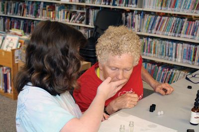 ‘Chillaxing’ at Plumb Library
‘Chillaxing’ at Plumb Library: Kara Underhill, 12, Emma Makuch, 10, and Bridget Farias, 11, joined Wellness Practitioner Marcia Hartley to mix essential oils in a stress-free zone on the snowy Tuesday of February 17. Chill-ax was part of Plumb Library’s school vacation week programming, which includes ‘Peace it On’ infant relaxation on February 20 from 11:30 am - 12:00 pm, with ‘Yoga 4 Kids’ to follow from 12:15 - 12:45 pm. Register at 508-763-8600. Photos by Jean Perry
