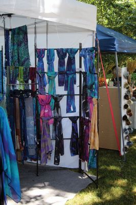 Arts in the Park
The Marion Art Center’s annual “Arts in the Park” event was greeted by a gorgeous weekend, as cars lined Marion’s streets and visitors strolled through Bicentennial Park, ducking into the shade of white tents to visit the many artisans and their goods. Patrons enjoyed live music outside the Art Center on Main Street, refreshments from a food truck and even visited with Elizabeth Taber. Photos by Mick Colageo
