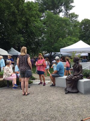 Arts in the Park
Several hundred people came out to enjoy the annual Arts in the Park fundraiser hosted by the Marion Art Center on July 10. Forty artists who had been invited by a MAC jury to participate featured their crafts and art objects. The jury ensures the quality of the items on display and also gives up-and-coming artisans a platform to showcase their work. Strolling along the paths, people found pottery, wearable art, custom crafted furniture, and a wide variety of jewelry. Photos by Marilou Newell
