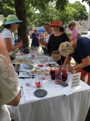 Arts In the Park 
The 11th annual Arts In the Park hosted by the Marion Art Center took place in Bicentennial Park on July 5th and featured art in a vast variety of visual forms from photography to jewelry to pottery to clothing. Photo by Marilou Newell
