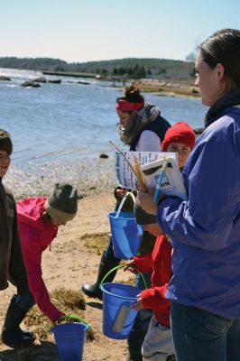 Buzzards Bay Coalition
One of the educational events the Buzzards Bay Coalition had planned for April vacation brought kids to the 6.1-acre property to explore the marshy beach for a scavenger hunt. The osprey from a nearby nest kept a close eye on the group until the treasures were tallied and the group waded back down the mud-puddled path to the road. Photo by Jean Perry
