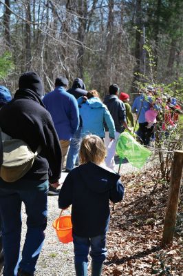 Buzzards Bay Coalition
One of the educational events the Buzzards Bay Coalition had planned for April vacation brought kids to the 6.1-acre property to explore the marshy beach for a scavenger hunt. The osprey from a nearby nest kept a close eye on the group until the treasures were tallied and the group waded back down the mud-puddled path to the road. Photo by Jean Perry
