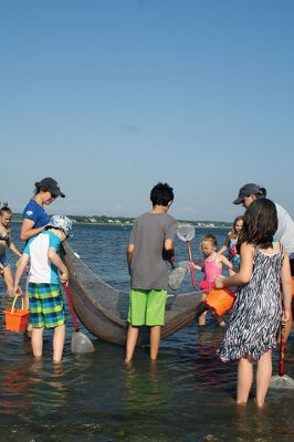 Seining the Shore
The Buzzards Bay Coalition hosted a “Seining the Shore” activity with a couple dozen kids at Silvershell beach on Friday, July 22. The kids practiced tossing the seine net to capture small sea creatures and explore what was caught. Photos by Jean Perry
