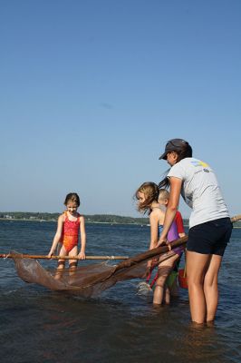 Seining the Shore
The Buzzards Bay Coalition hosted a “Seining the Shore” activity with a couple dozen kids at Silvershell beach on Friday, July 22. The kids practiced tossing the seine net to capture small sea creatures and explore what was caught. Photos by Jean Perry
