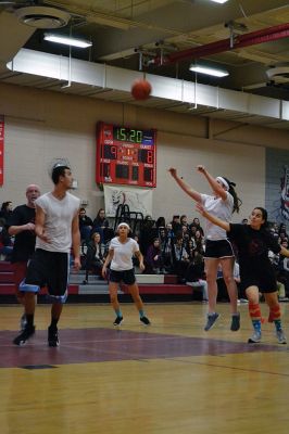  Students Teacher Basketball
 Students and teachers did about as much playing around as they did playing basketball during the students versus teachers co-ed basketball game at Old Rochester Regional High the evening of March 7. The teams were neck and neck throughout the evening – students in white and teachers in black – and neither team seemed to have an advantage over the other at any point during the game. Photo by Jean Perry
