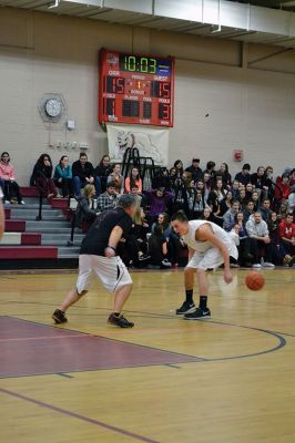  Students Teacher Basketball
 Students and teachers did about as much playing around as they did playing basketball during the students versus teachers co-ed basketball game at Old Rochester Regional High the evening of March 7. The teams were neck and neck throughout the evening – students in white and teachers in black – and neither team seemed to have an advantage over the other at any point during the game. Photo by Jean Perry
