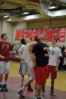  Students Teacher Basketball
 Students and teachers did about as much playing around as they did playing basketball during the students versus teachers co-ed basketball game at Old Rochester Regional High the evening of March 7. The teams were neck and neck throughout the evening – students in white and teachers in black – and neither team seemed to have an advantage over the other at any point during the game. Photo by Jean Perry
