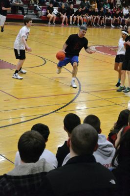  Students Teacher Basketball
 Students and teachers did about as much playing around as they did playing basketball during the students versus teachers co-ed basketball game at Old Rochester Regional High the evening of March 7. The teams were neck and neck throughout the evening – students in white and teachers in black – and neither team seemed to have an advantage over the other at any point during the game. Photo by Jean Perry
